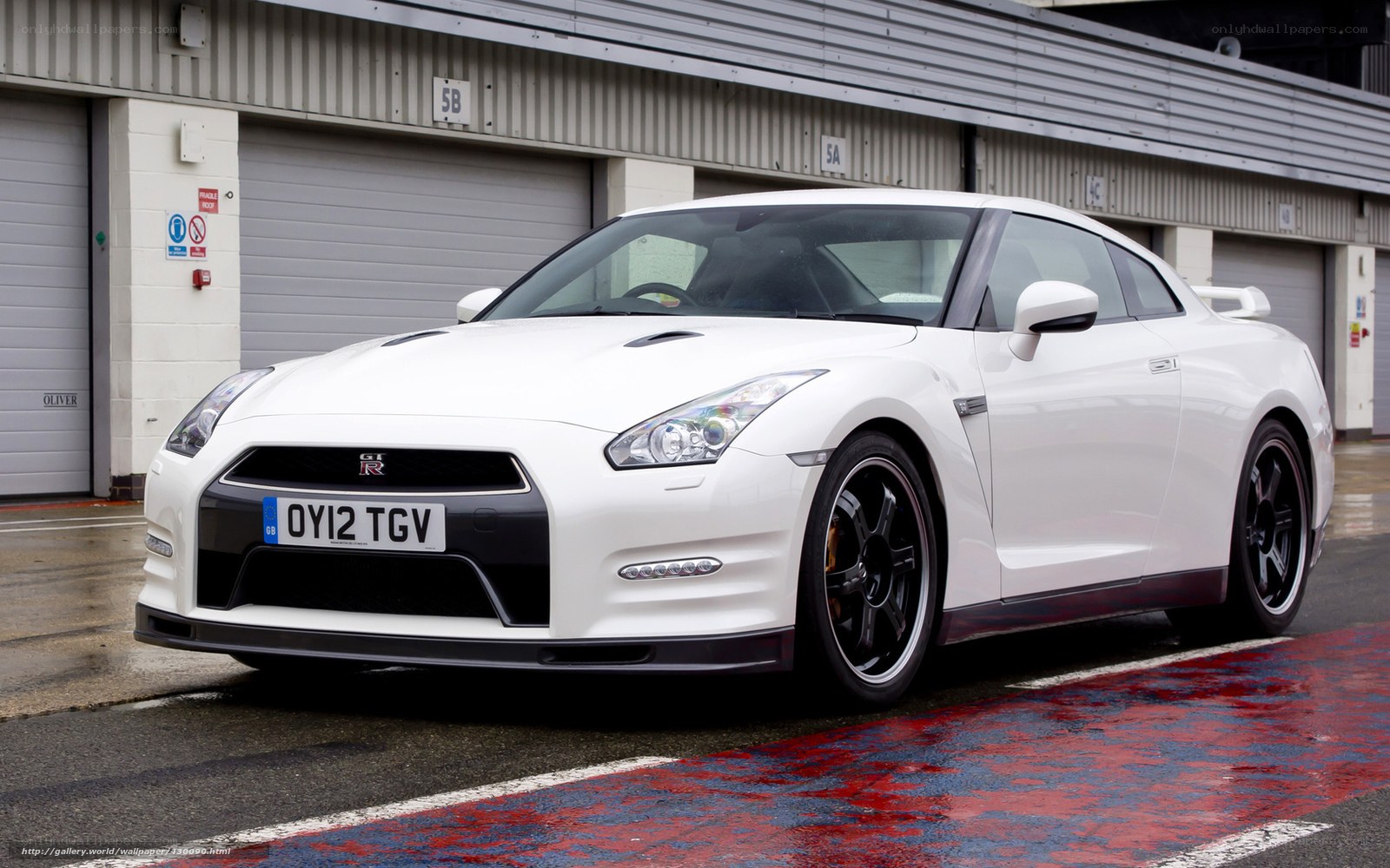 White Nissan GT-R on track