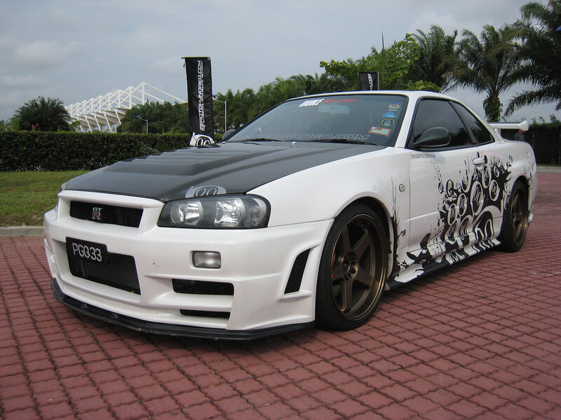 white nissan gt-r with custom graphics