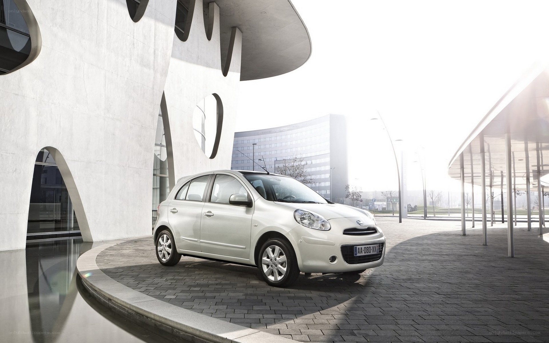White Nissan Micra in modern setting