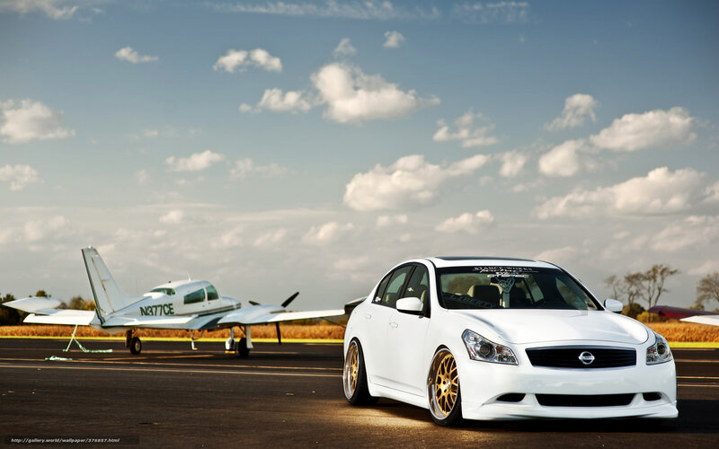 White Nissan on airfield