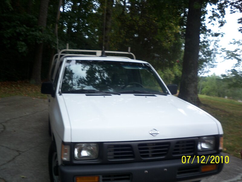 white nissan pickup truck