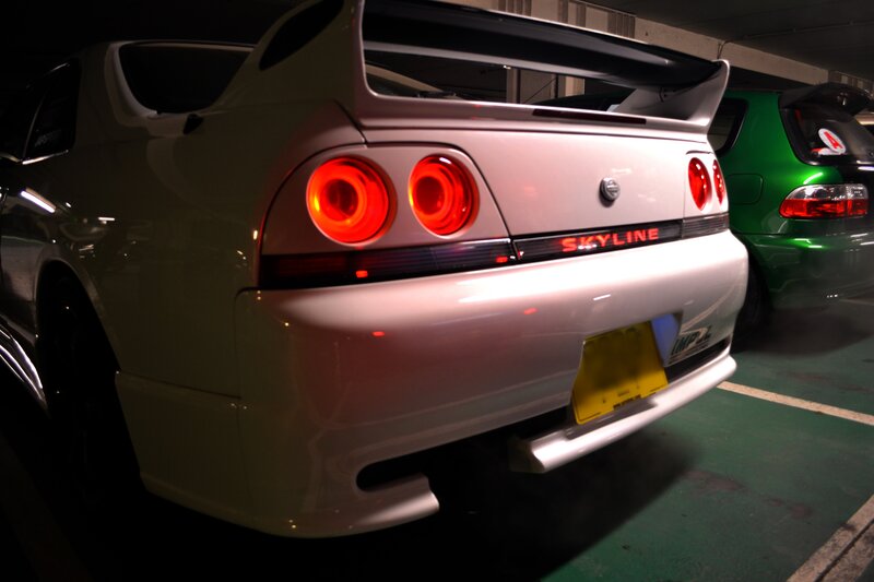 white nissan skyline rear view