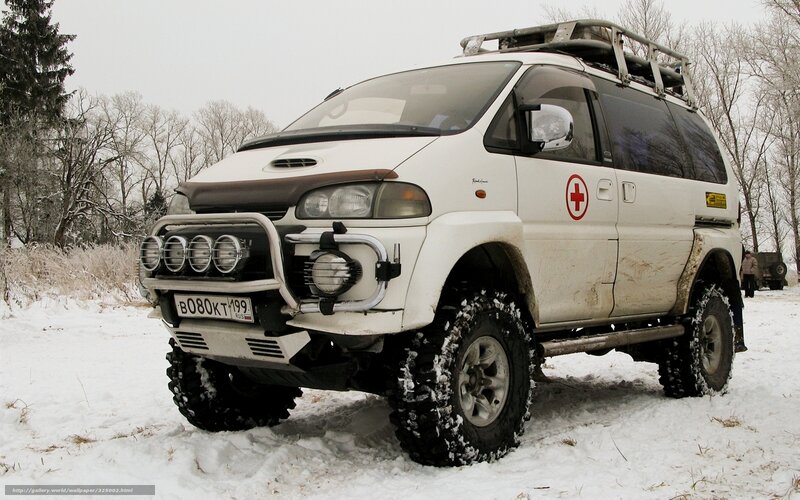 White off-road van in snow