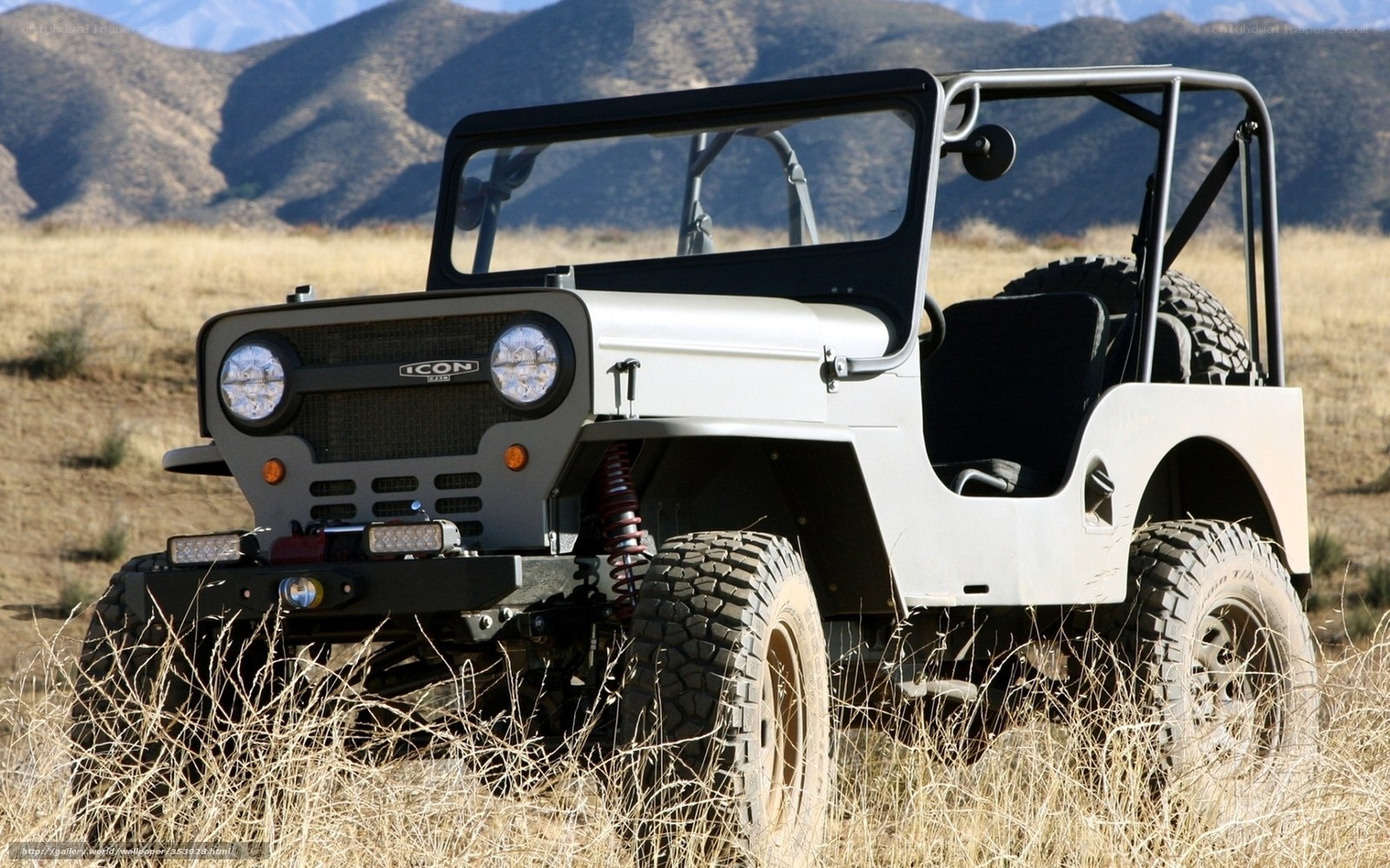 White off-road vehicle in desert
