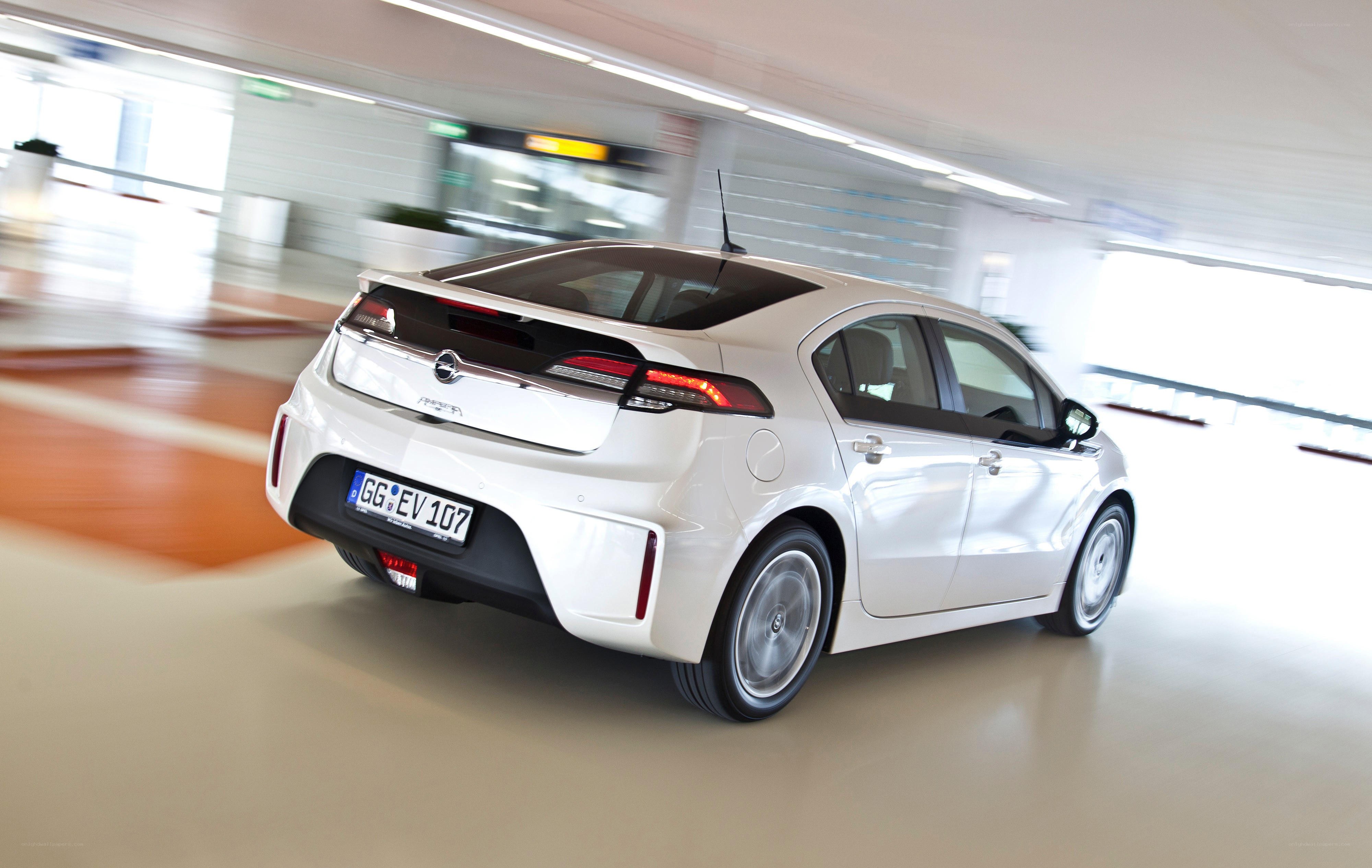 white opel ampera in motion