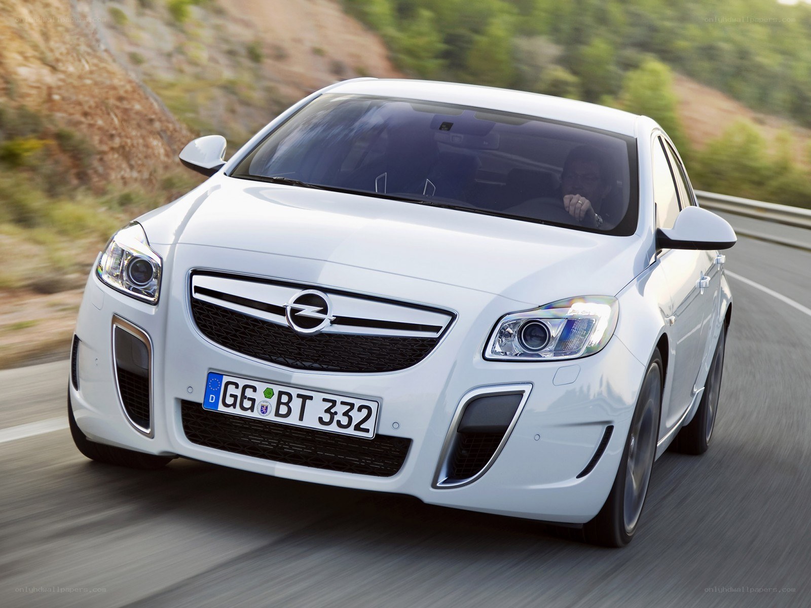 white opel in motion
