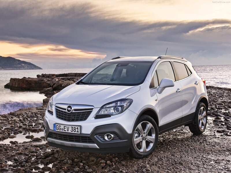 White Opel Mokka by the sea