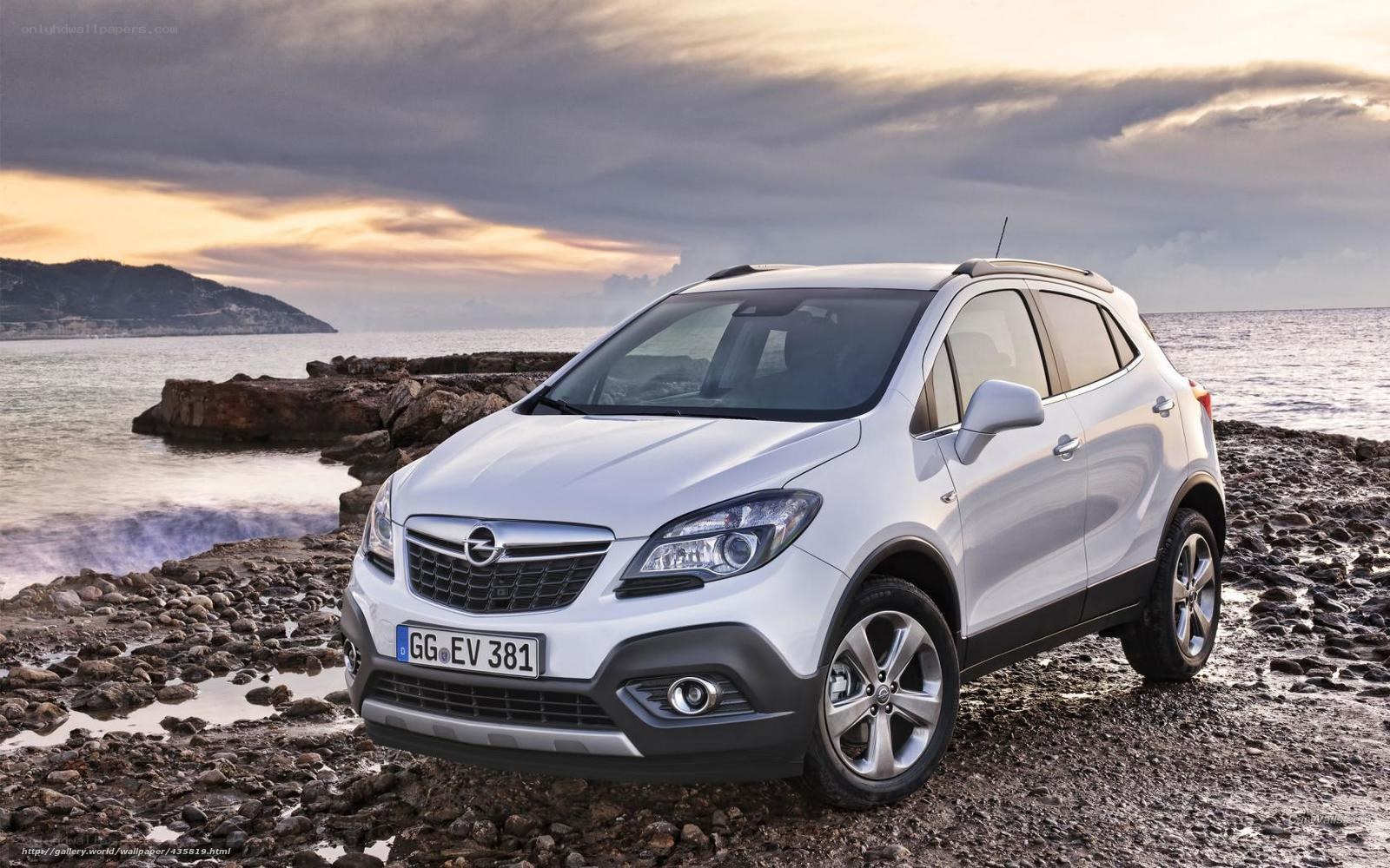 White Opel Mokka by the sea