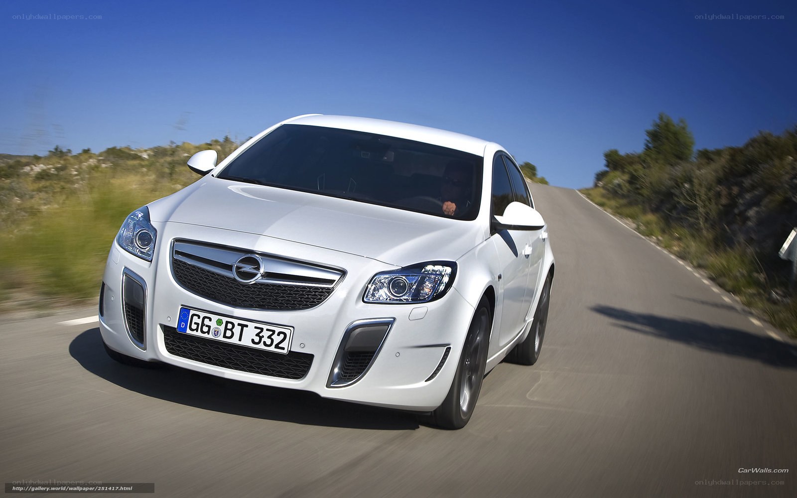 white opel on a winding road