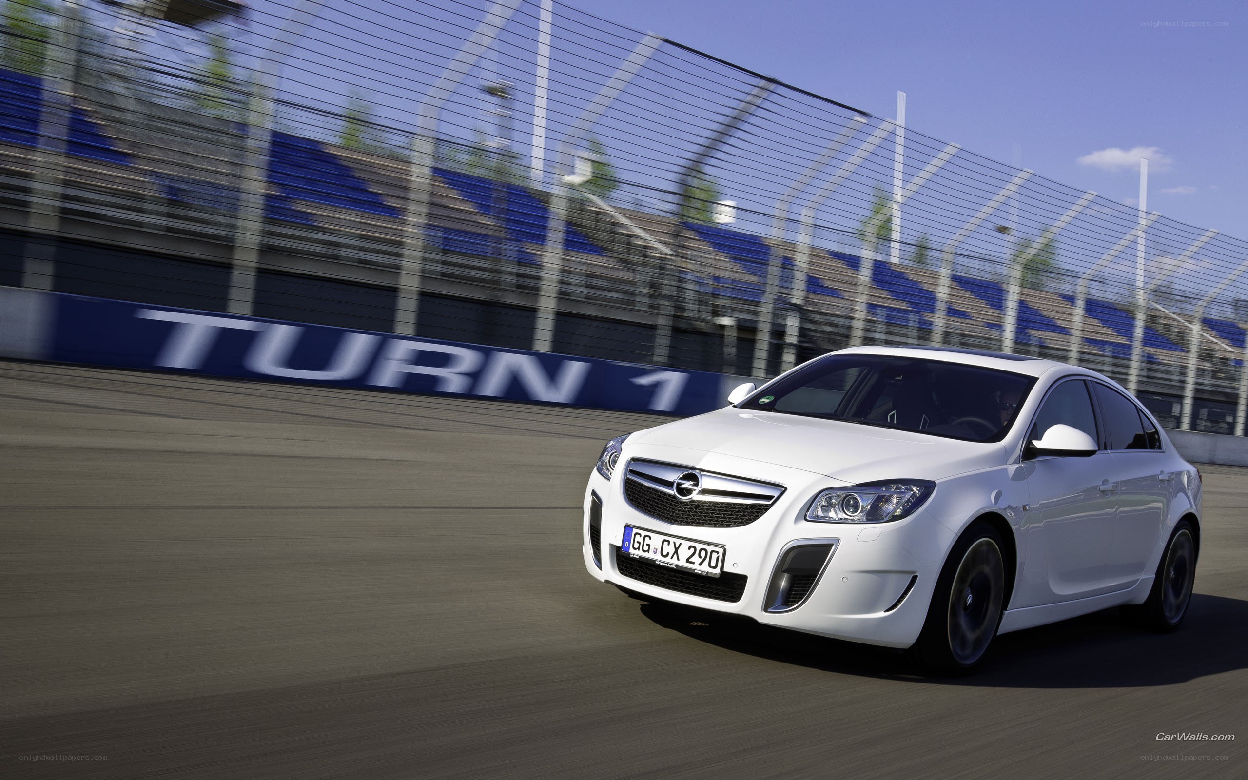 white opel on racetrack