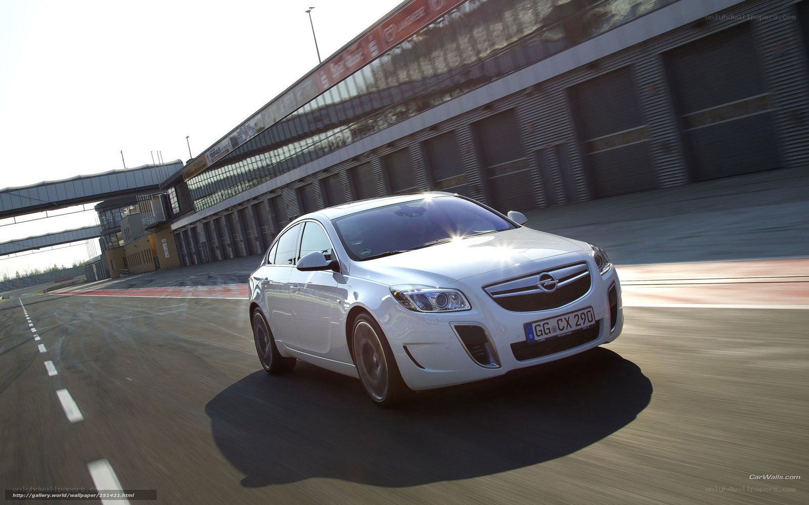 white opel on racetrack
