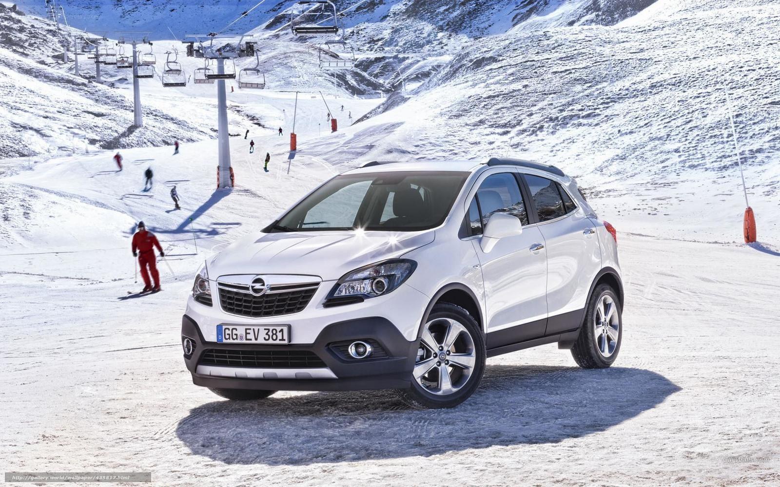 White Opel SUV on snowy slope
