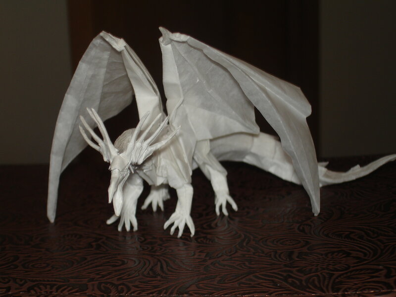 white origami dragon sculpture