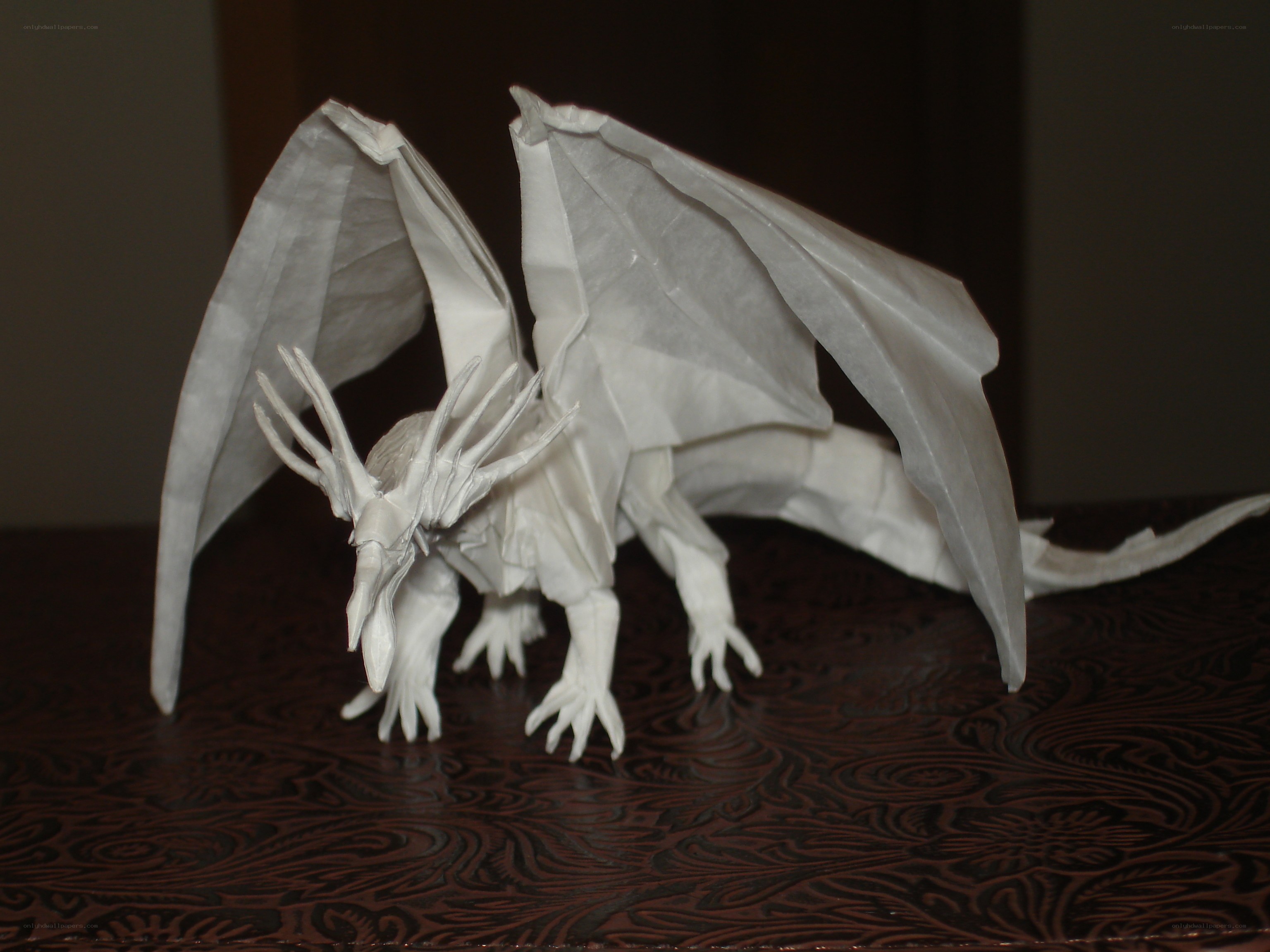 white origami dragon sculpture