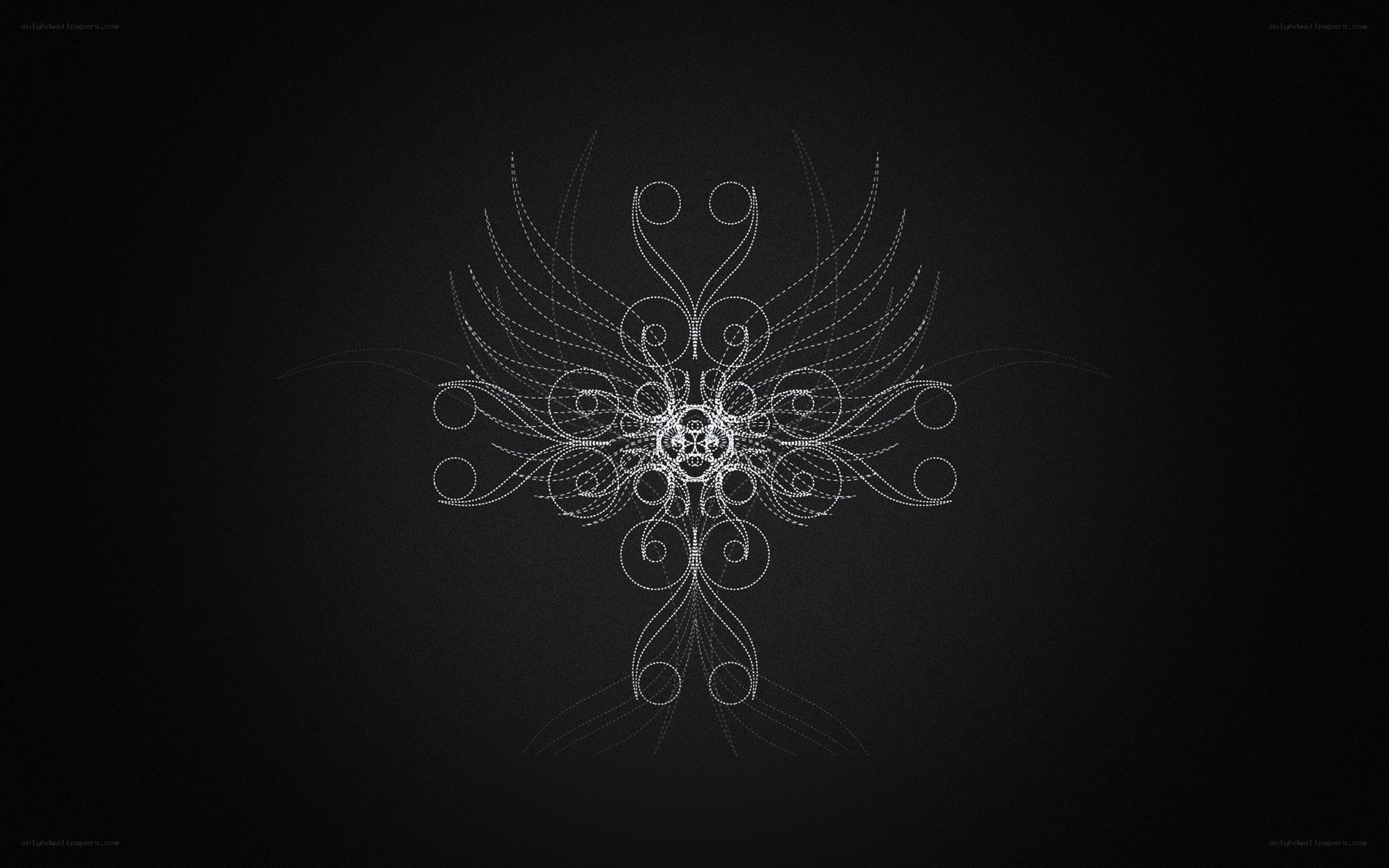 white ornate design on black