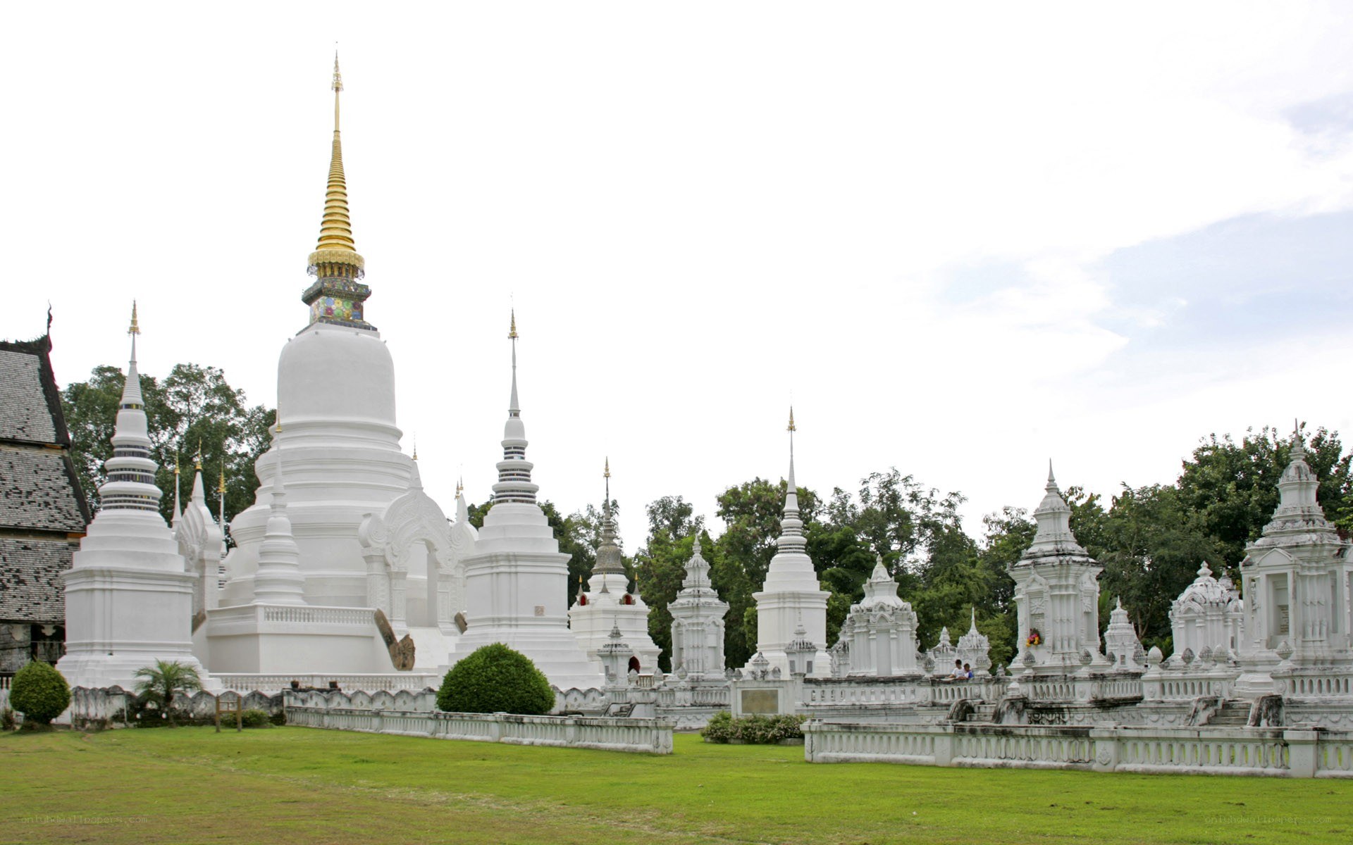 White pagodas in a temple complex
