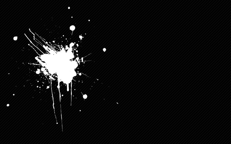 white paint splatter on black