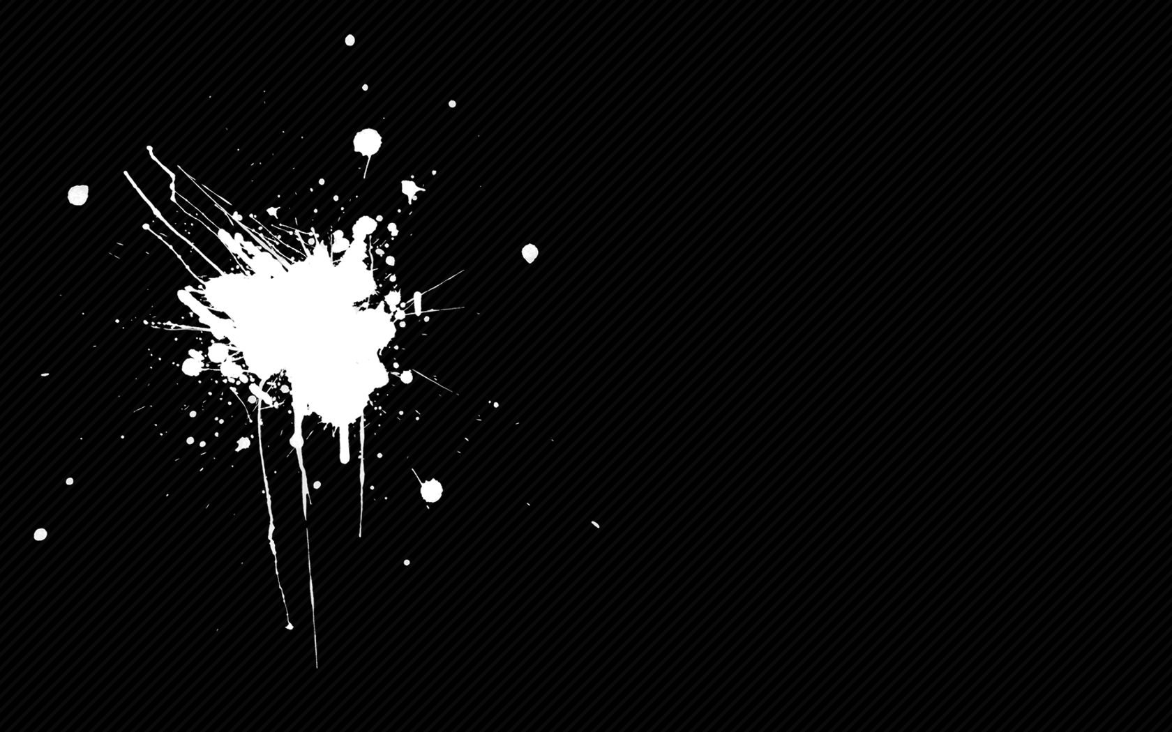 white paint splatter on black