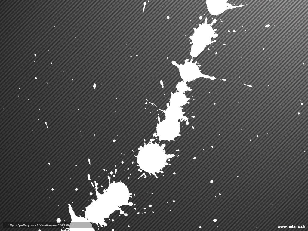 white paint splatters on dark background