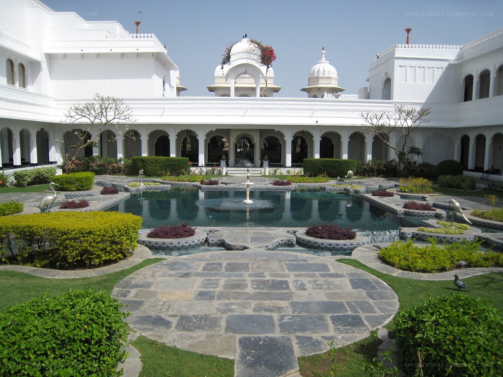 white palace courtyard with pool