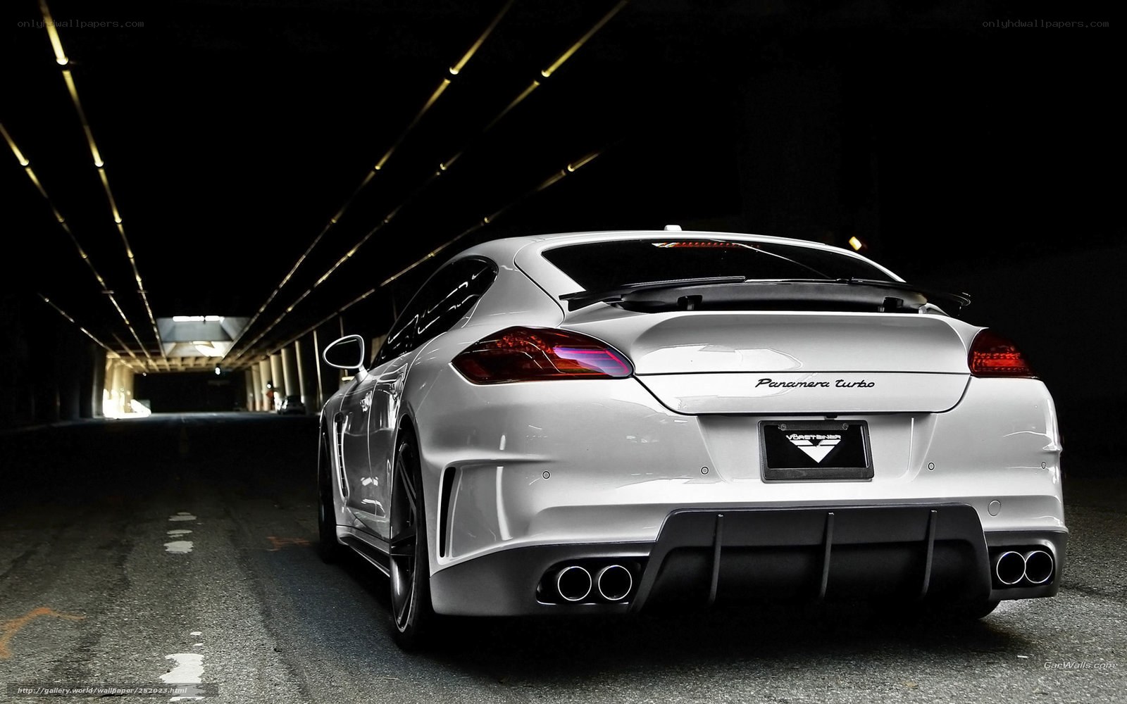 white panamera turbo in tunnel
