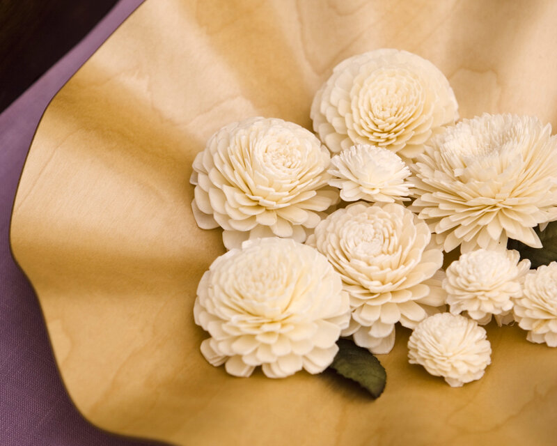 White paper flowers in a bowl
