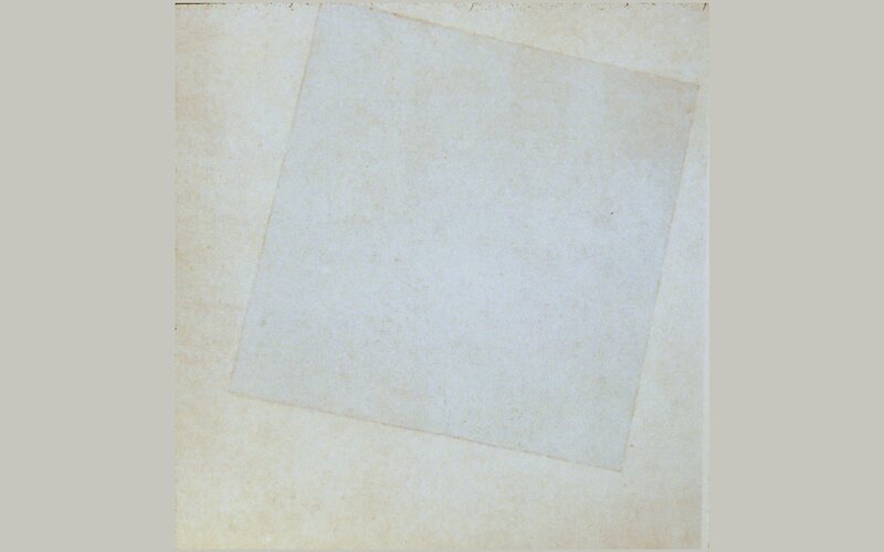 white paper on beige background