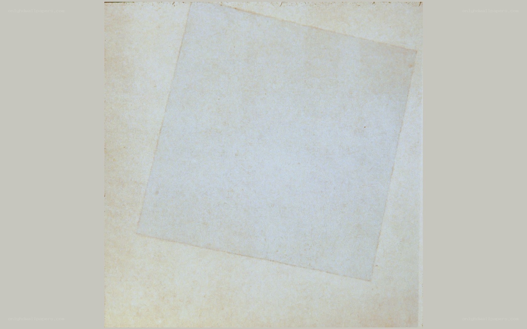 white paper on beige background