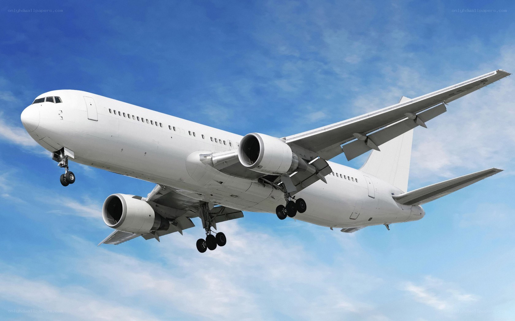 White passenger airplane in flight