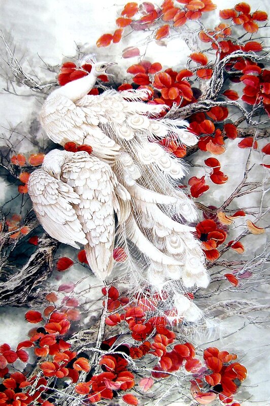 White peacocks in autumn foliage
