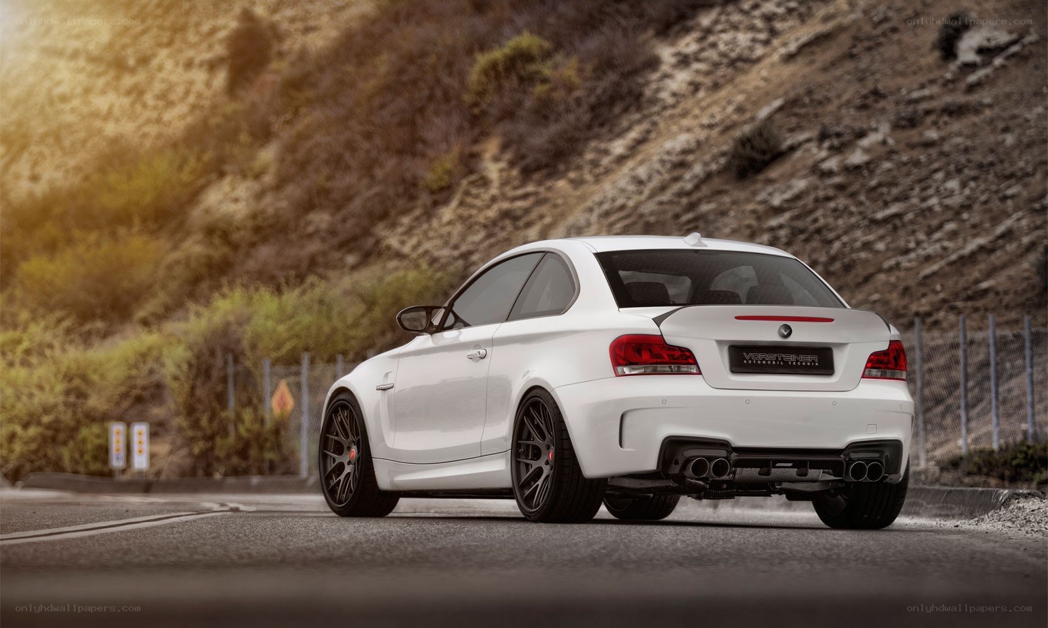white performance car on road