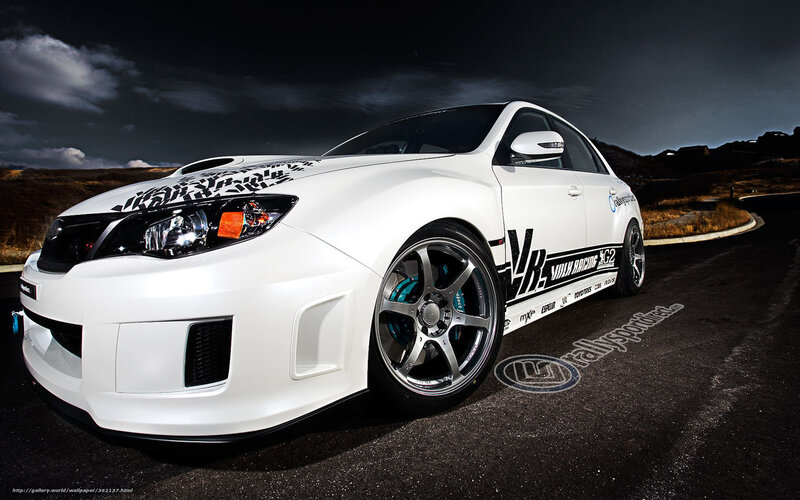white performance car on road