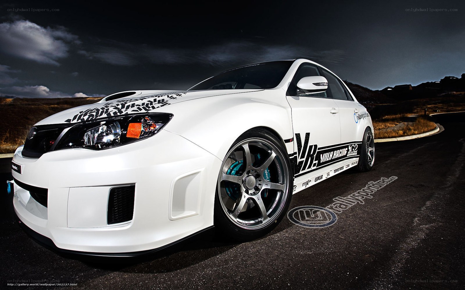 white performance car on road