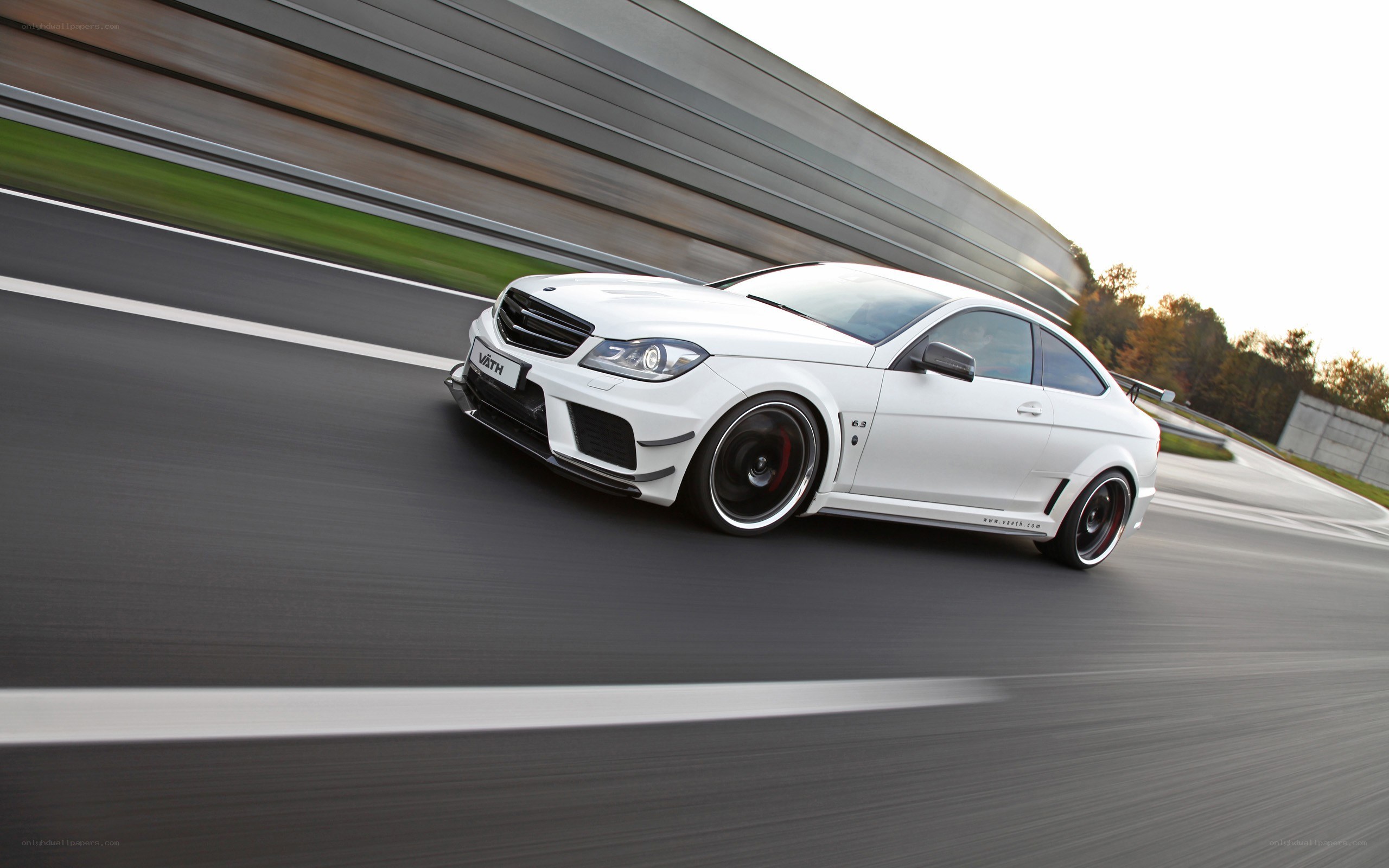 white performance car on track