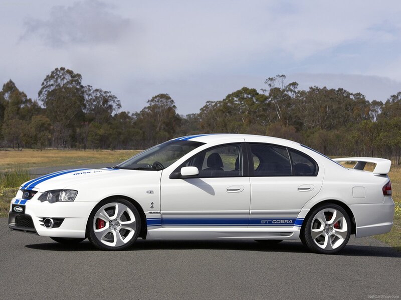 White Performance Sedan — Calm, Afternoon