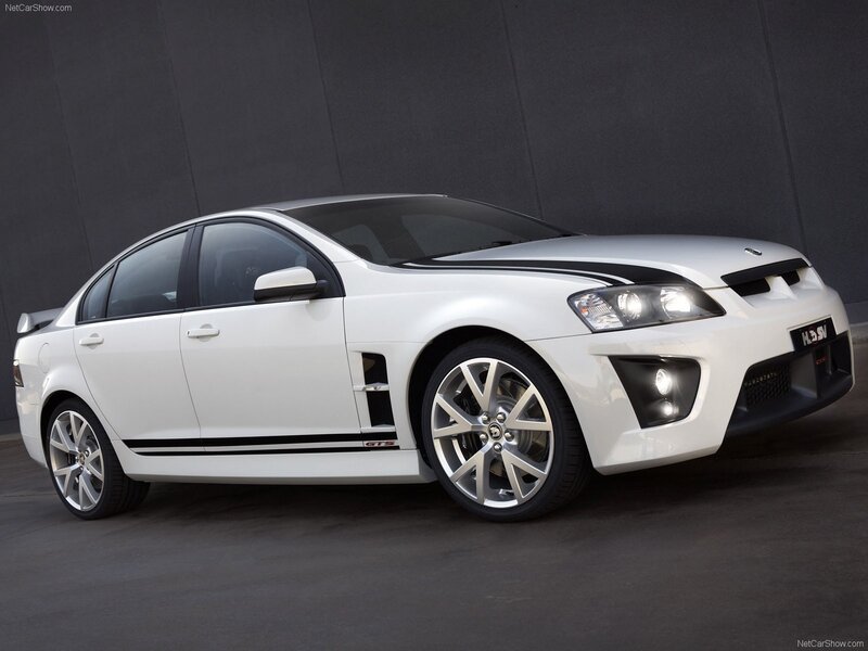 White Performance Sedan — Dramatic, Photograph, Black Stripes