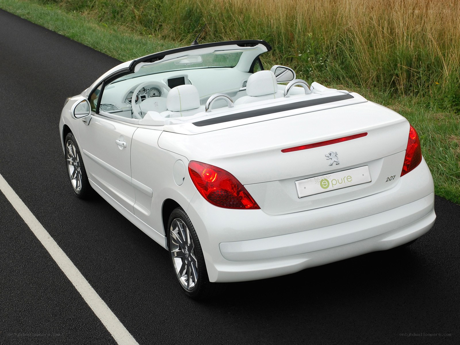 White Peugeot 207 convertible