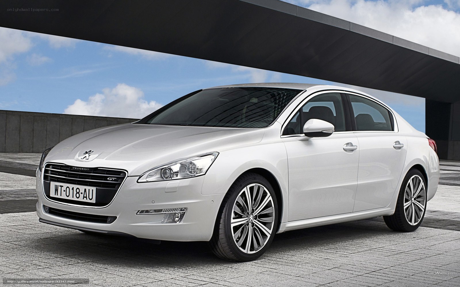 White Peugeot G7 sedan