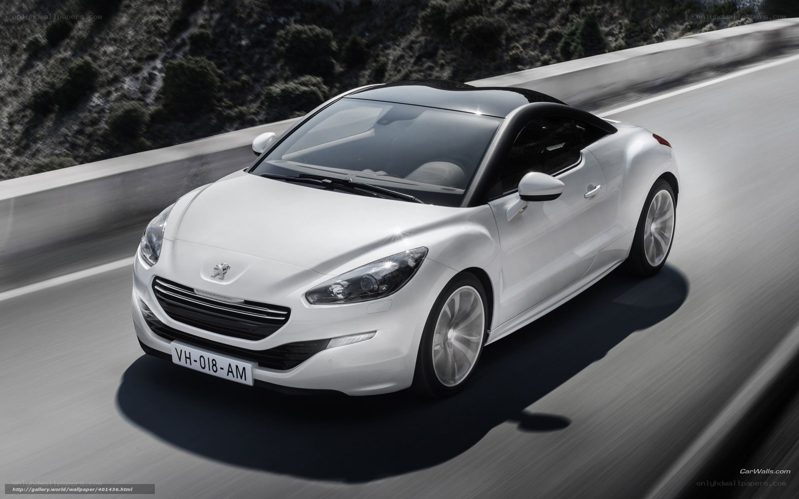 White Peugeot RCZ in motion