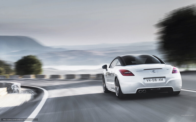 White Peugeot RCZ in motion