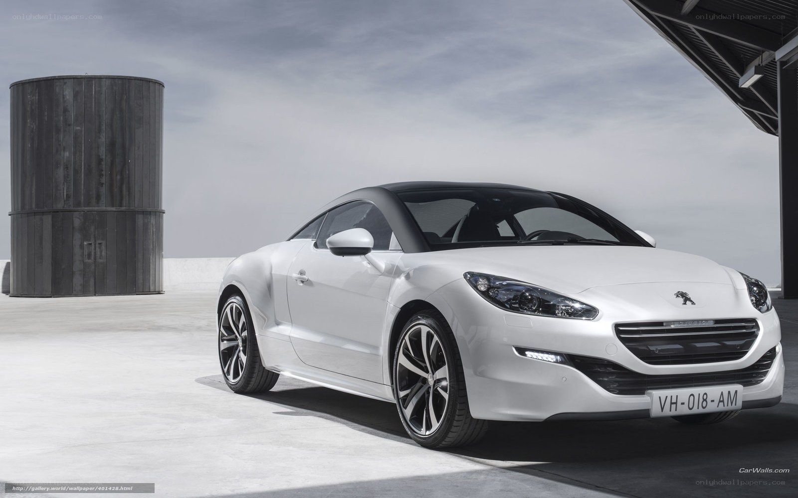 White Peugeot RCZ sports car