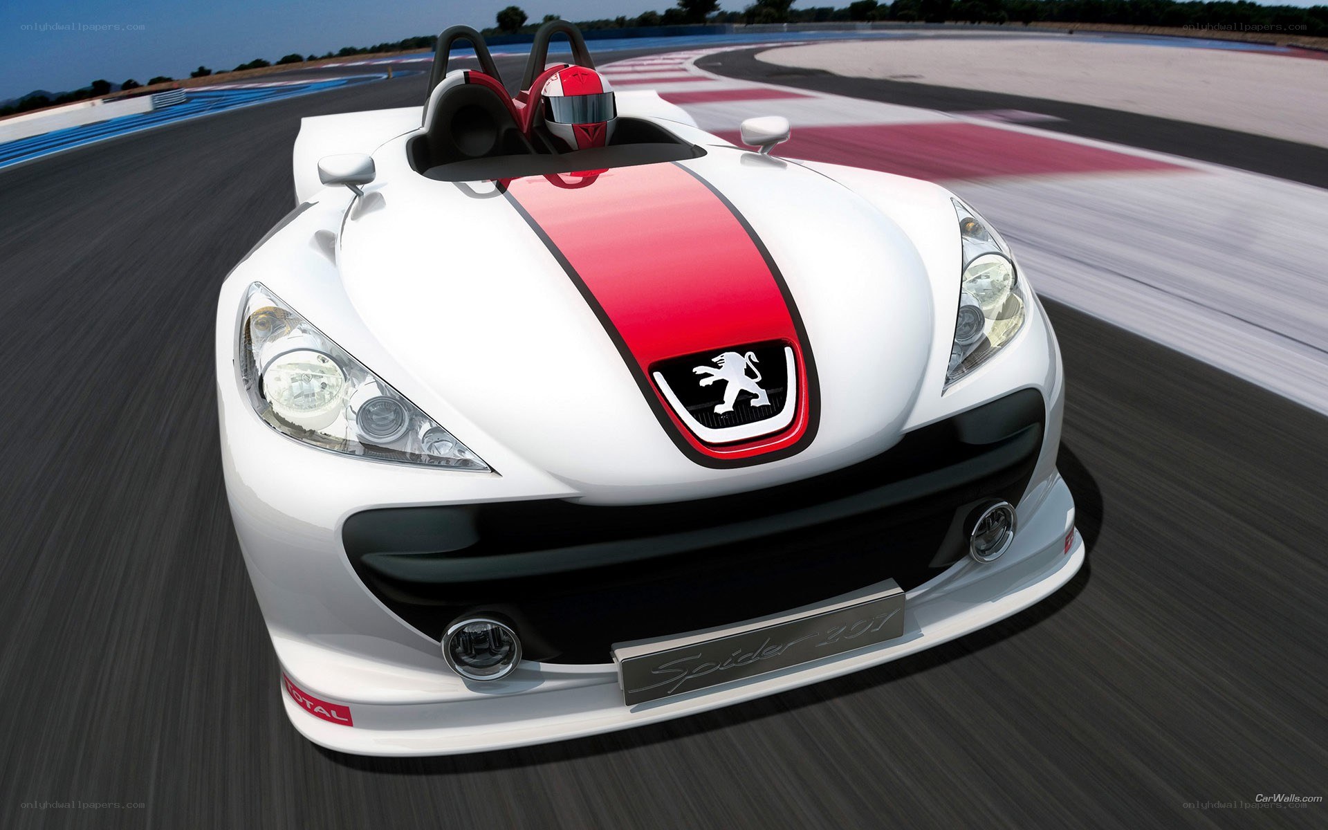 White Peugeot Spider on racetrack