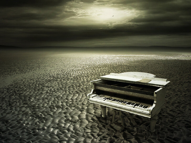 White Piano on Beach