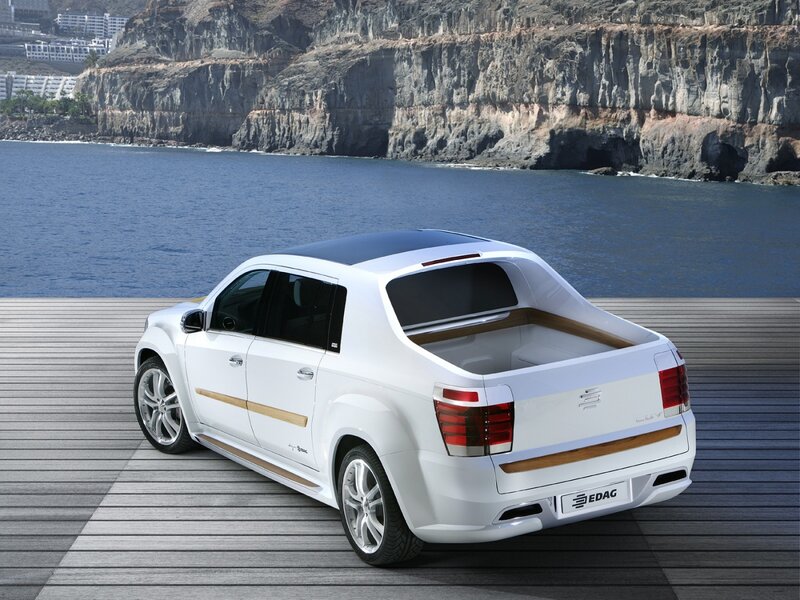 White pickup truck by the sea