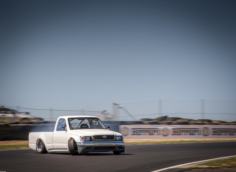 White Pickup Truck — Dynamic, Afternoon, Photograph, Race Track