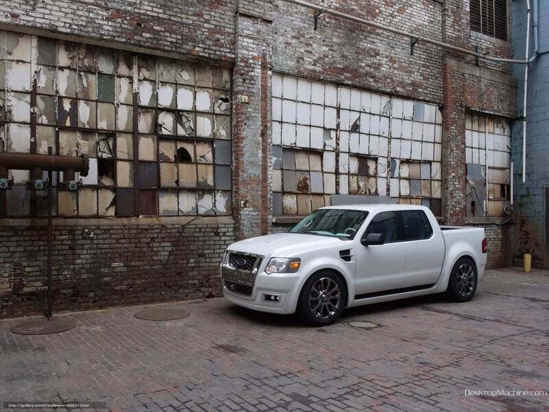 White pickup truck in alley