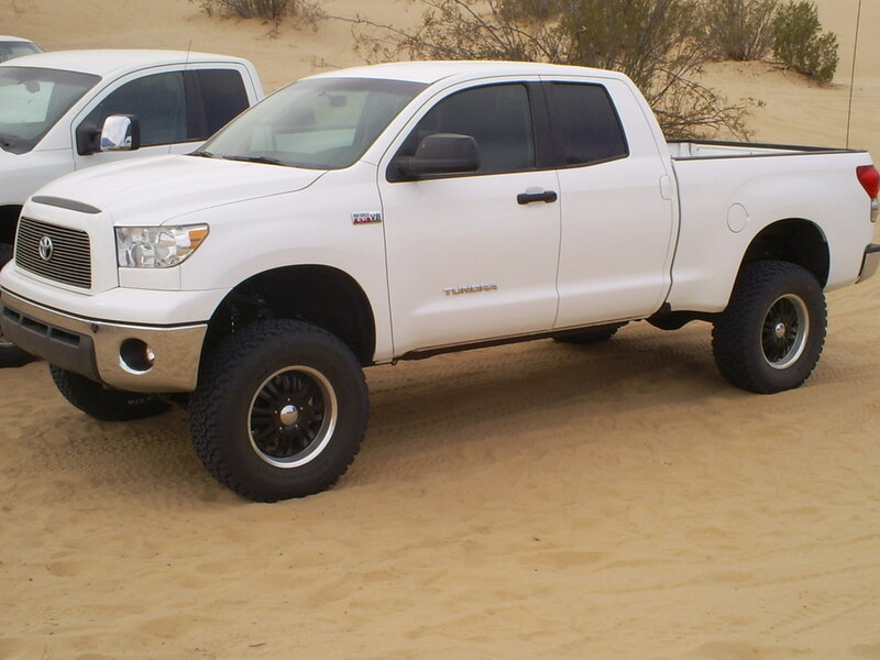 white pickup truck in desert