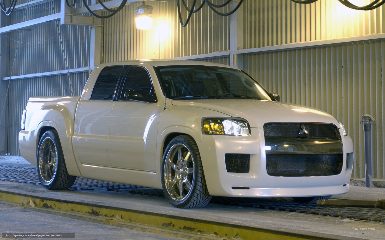 white pickup truck in garage