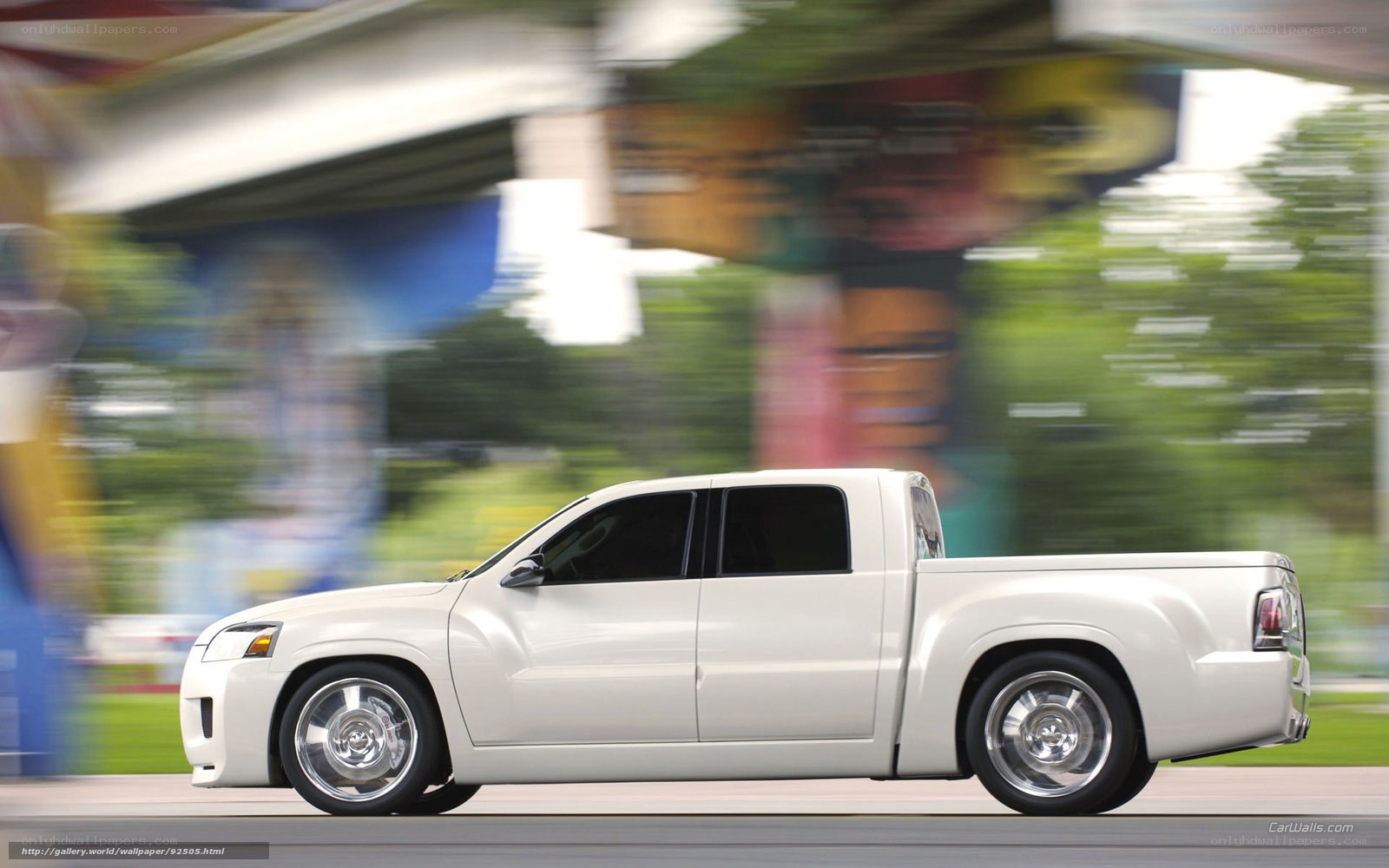white pickup truck in motion