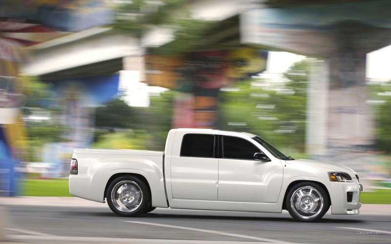 white pickup truck in motion
